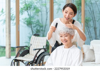 Senior Woman and Visiting Hairdresser - Powered by Shutterstock