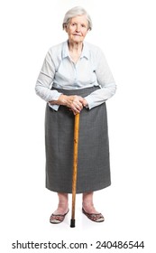 Senior Woman With Walking Stick Standing Over White