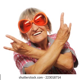 Senior Woman Wearing Big Sunglasses Doing Funky Action Isolated On White Background 