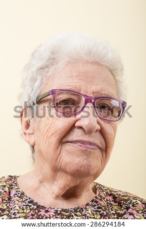 Similar – Image, Stock Photo Elderly woman in yellow top with a warm smile