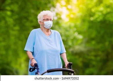 Senior Woman Wearing Face Mask During Corona Virus And Flu Outbreak. Disease And Illness Protection. Surgical Masks For Coronavirus Prevention. Sick Elderly Patient Coughing. Ill Person.