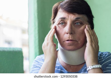 Senior Woman Wearing Neck Brace