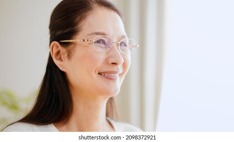 Senior Woman Wearing Reading Glasses