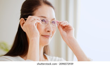 Senior Woman Wearing Reading Glasses