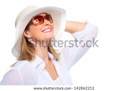 Senior Woman wearing sunglasses and a hat. Summer vacation.