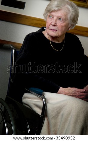Similar – Image, Stock Photo Senior woman in a wheelchair alone in a room