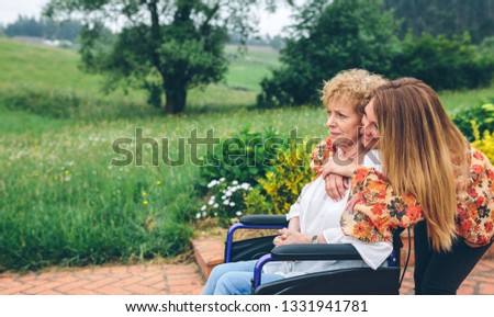 Similar – Senior woman in wheelchair