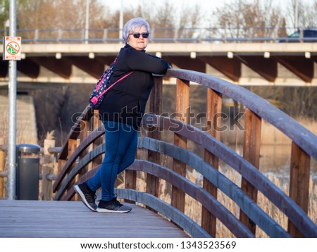 Similar – Active and sporty woman runner in autumn nature