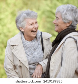 Senior women, comic and laughing in nature for reunion, together and funny chat for trip in outdoor. Elderly friends, joke and silly discussion on travel vacation in england, care and social in park - Powered by Shutterstock