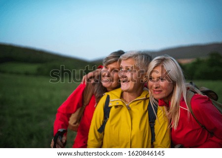 Similar – Image, Stock Photo Woman at dusk on the beach