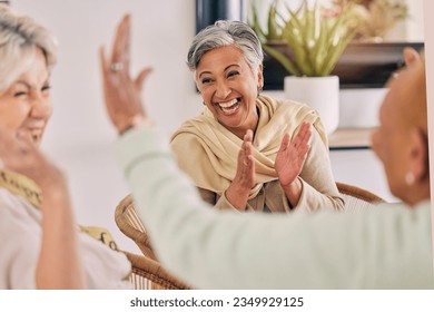 Senior women, happy and celebration at a birthday party or event with clapping and excited. Elderly friends, smile and laughing in retirement and nursing home with conversation, friendship and fun - Powered by Shutterstock