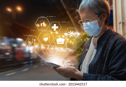 Senior Women Using The Smartphone For Looking For Health Solutions Or Hospitals In Train Stations.Concept Of Technology For Elderly Health Care.