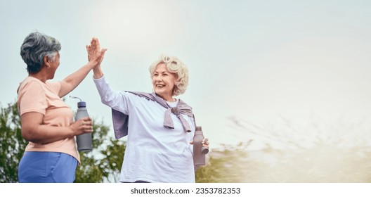 Senior women, walking and high five for motivation and workout success from outdoor fitness. Banner, elderly friends and happy from sport and exercise together with support smile and mockup space - Powered by Shutterstock