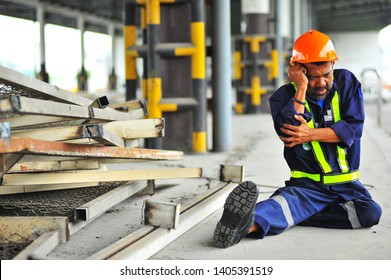 Senior worker with broken arm working accident because work in warehouse. - Powered by Shutterstock