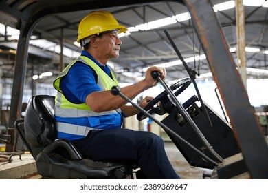 senior worker driving forklift in the factory - Powered by Shutterstock