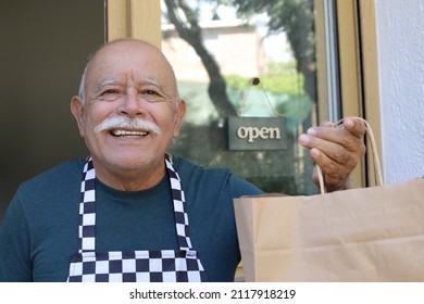 Senior Worker Giving To Go Bag