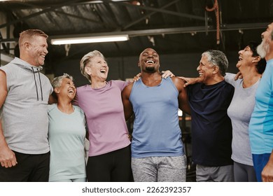 Senior workout group, laugh and personal trainer, smile or support for wellness goal. Elderly women, team building and happy at gym for friends, solidarity and diversity for teamwork motivation hug - Powered by Shutterstock