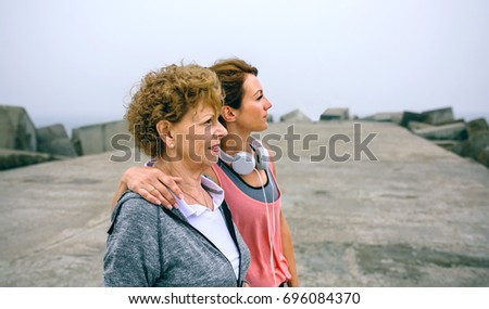 Similar – Image, Stock Photo Senior and young sportswoman looking away