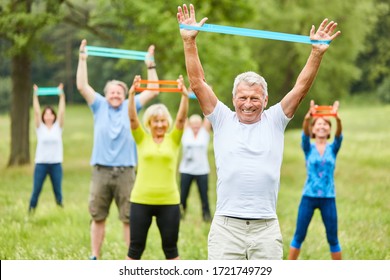 Seniors Exercise Fitness With Stretch Band In Physiotherapy In Rehab Course