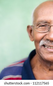 Seniors And Feelings, Elderly Black Man With Glasses And Mustache Smiling. Cropped View, Copy Space