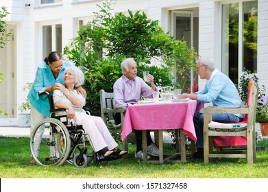 Seniors Having Lunch At Seniors' Living Community