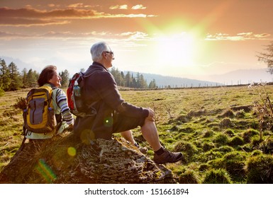 Seniors Hiking In Nature On An Autumn Day