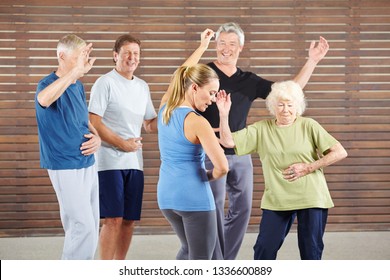 Seniors Learn To Dance Samba In A Dance Class With A Dance Teacher