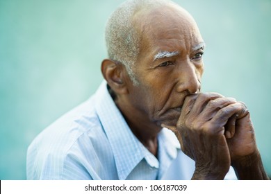 Seniors portrait of contemplative old african american man looking away. Copy space