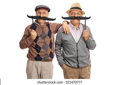 Seniors Posing With Big Fake Moustaches Isolated On White Background 