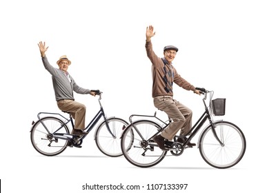 Seniors riding bicycles and waving at the camera isolated on white background