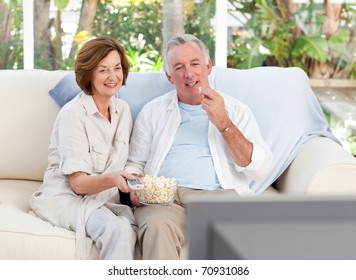 Seniors Watching Tv At Home