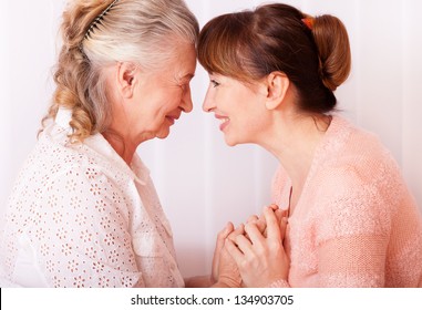 Seniors Woman With Her Caregiver At Home