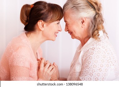 Seniors Woman With Her Caregiver At Home