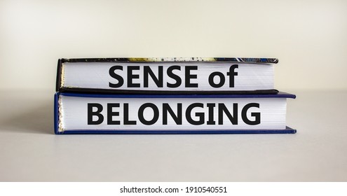 Sense Of Belonging Symbol. Books With Words 'sense Of Belonging' On Beautiful White Background. Business, Sense Of Belonging Concept. Copy Space.