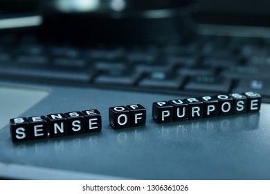 Sense of Purpose text wooden blocks in laptop background. Business and technology concept - Shutterstock ID 1306361026