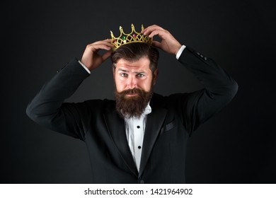 Sense of self importance. Big boss. King crown. Egoist concept. Businessman in tailored tuxedo and crown. Very important person. Important guest luxury party. Top manager. Important person award.