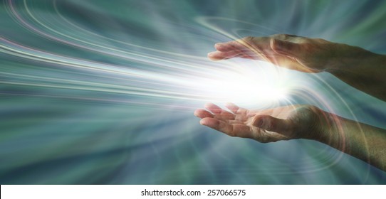 Sensing Supernatural Energy - Parallel Female Hands With A Swirling Light Burst Between On A Blue Energy Field Background