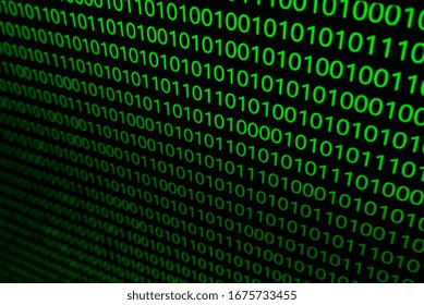 Sensitive focus image of Green binary code on black background