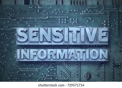 Sensitive Information Phrase Made From Metallic Letterpress Blocks On The Pc Board Background