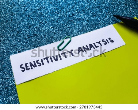 Sensitivity analysis writting on blue background. 