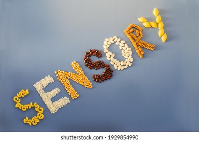 Sensory Word Written Of Rice, Popcorn, Beans, Pasta. Sensory Play For Child At Home. Activities Montessori, Games For Sensory Processing Disorder, Child Development And Occupational Therapy