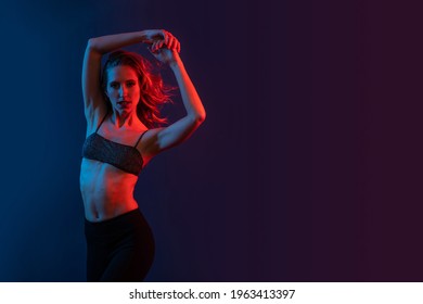 Sensual Blonde Woman Studio Portrait With Copy Space. Colored Gel Photography.