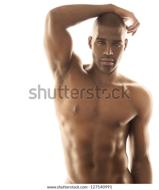 性感的时尚肖像一个合适的裸体男性模特构成对明亮的白色背景库存照片 立即编辑