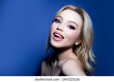 Sensual Female Model Face. Portrait Of Beautiful Model With Natural Nude Make Up. Beauty Girl With Sexy Tongue.