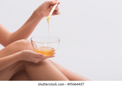 Sensual girl making waxing epilation