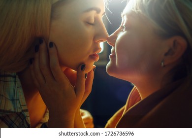 Sensual Kiss Of Two Beautiful Lesbian Girls Close-up.  Lesbian Couple, Gay Marriage Concept