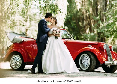 Sensual Kiss Of The Two In Their Wedding Day