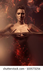 sensual nude woman in fire