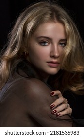 Sensual Portrait Of A Teenage Girl. Growing Up Of A Woman. Close Up. Black Background. Vertical.