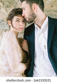 Sensual portrait of a young couple. Wedding couple groom and bride together on wedding day.  Fine art photography 